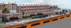 The central factory and terraced houses cover the fiddle yard.