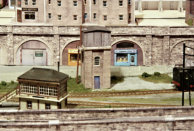 The water tower & tank is a cut-down ScaleScenes kit. The signal box is a Ratio plastic kit, railings are yet to be added.