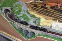 The viaduct and tunnel, with first stage of grass coverage applied to the moorland.