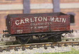 It has been given a wash of acrylic paint and then weathering powder, and replacement DG couplings.