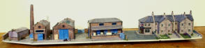 This module has the the three industrial units, the pub & terraced houses. It is in the middle ground, over the servo motors and control units for the points and track sensors.