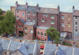 Low relief warehouses at the rear.